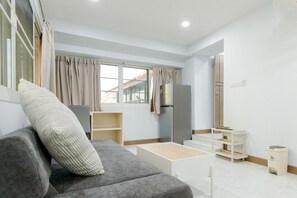 Chambre Premium, 1 chambre, salle de bains privée, vue cour intérieure | Coin séjour