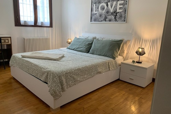 First bedroom with a spacious and comfortable doublebed