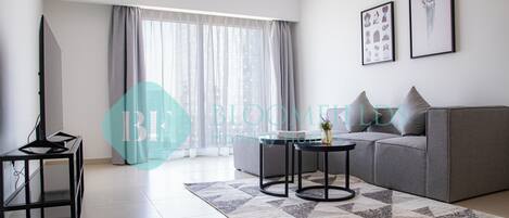 Comfort Apartment | Living area | TV