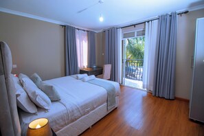 Junior Suite | In-room safe, desk, laptop workspace, blackout drapes - The Mansion Hotel (Jinja)