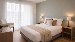 A modern bedroom with a large bed, bedside tables, a chair, and a desk with a plant. - Zenao Appart'hôtel Saint-Maur-des-Fossés (Saint-Maur-des-Fosses)