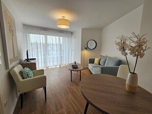 Departamento, 1 habitación | Área de sala de estar