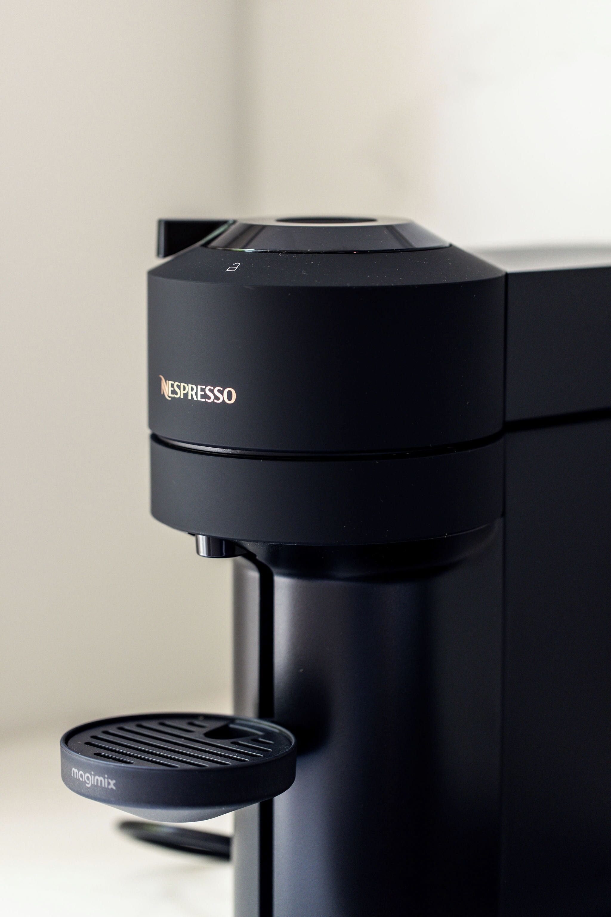 A Nespresso coffee machine with a Magimix coffee pod holder.