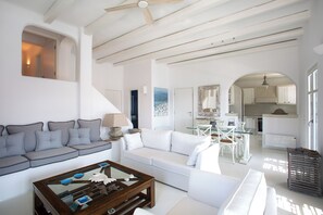 Villa, Sea View | Living area | 42-inch Smart TV with digital channels, fireplace, printers - Mv Kythnos (Kithnos)
