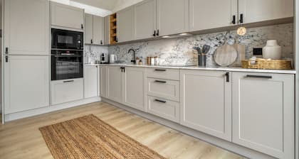 Beachfront eco-friendly penthouse with ocean view and modern interior sleeping up to 5