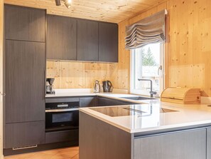 Oven, dishwasher, toaster, dining tables