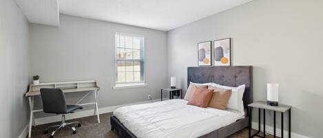 1 bedroom, desk, iron/ironing board, travel crib