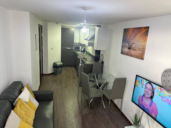 Appartement, 1 chambre | Aire de séjour