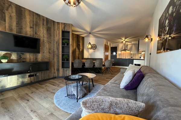 Comfort Apartment, 3 Bedrooms, Sauna, Mountain View | Living area | 50-inch flat-screen TV with cable channels