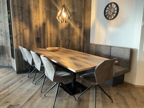 Comfort Apartment, 3 Bedrooms, Sauna, Mountain View | Living area | 50-inch flat-screen TV with cable channels