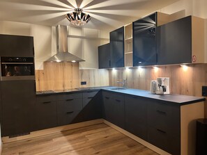 Comfort Apartment, 3 Bedrooms, Sauna, Mountain View | Private kitchen | Coffee/tea maker, electric kettle, toaster, highchair - Apartment Iglsberg Top 6 (Saalbach-Hinterglemm)