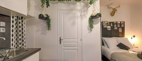 1 bedroom, desk, iron/ironing board, travel crib