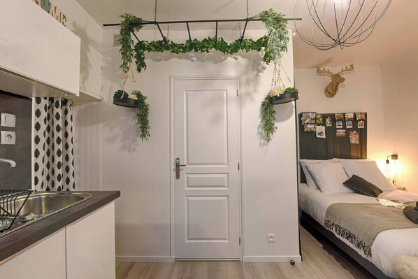 1 bedroom, desk, iron/ironing board, travel cot