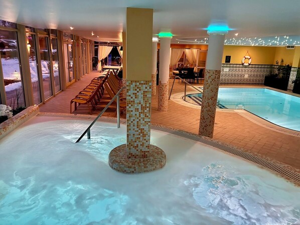 2 indoor pools, seasonal outdoor pool, pool umbrellas, pool loungers