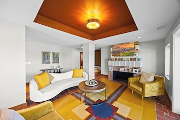 Living Room: Cozy comfort meets modern style — unwind in this bright and inviting Airbnb living room, perfect for relaxing after a day of exploring.