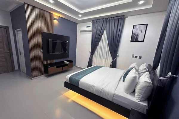 Family Room, Balcony, City View | Desk, laptop workspace, blackout drapes, soundproofing