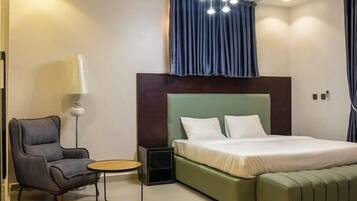 Family Room, Balcony, City View | Desk, laptop workspace, blackout drapes, soundproofing