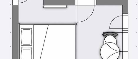Een plattegrond met een groot bed, een bureau, een stoel, een klein tafeltje en een toilet.