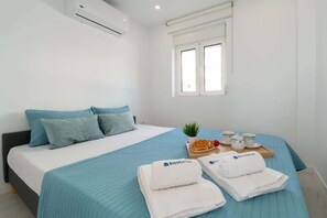 2 habitaciones, tabla de planchar con plancha, wifi y ropa de cama 