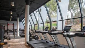 A gym with treadmills, exercise bikes, and free weights. - 2 Bedroom Apartment @Estepona Hills With Sea View! (Estepona)