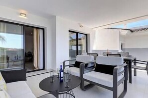 Outdoor dining - Luxurious Apartment @ Estepona Hills with views! (Estepona)