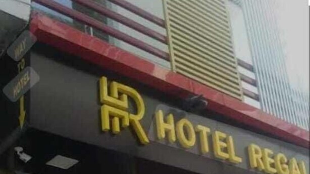 A hotel entrance with a sign reading "HOTEL REGAL". - Hotel Regal (Saharanpur)
