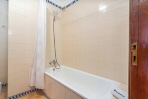 Shower, hair dryer, towels - Bright & Cozy House with Terrace by HostWise (Cabanas)
