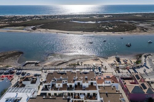 Bright & Cozy House with Terrace by HostWise