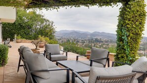 An outdoor patio with a view of a city and mountains. - 2 Mi to Promenade at Westlake: Mtn-view Haven! (Westlake Village)