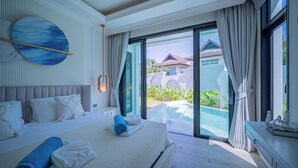 A spacious bedroom with a large bed, a view of a swimming pool, and a balcony. - FIFTH ELEMENT pool villa by NLA (Choeng Thale)
