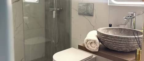Hair dryer, towels, soap, shampoo