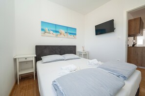 Apartemen, 3 kamar tidur, Boleh Merokok, balkon | 4 kamar tidur
