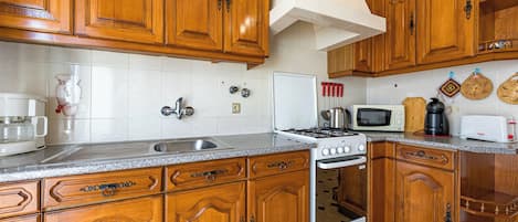Apartment | Private kitchen | Fridge, microwave, oven, stovetop