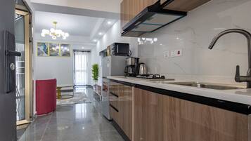 Leilighet – deluxe, elveutsikt | Eget kjøkken