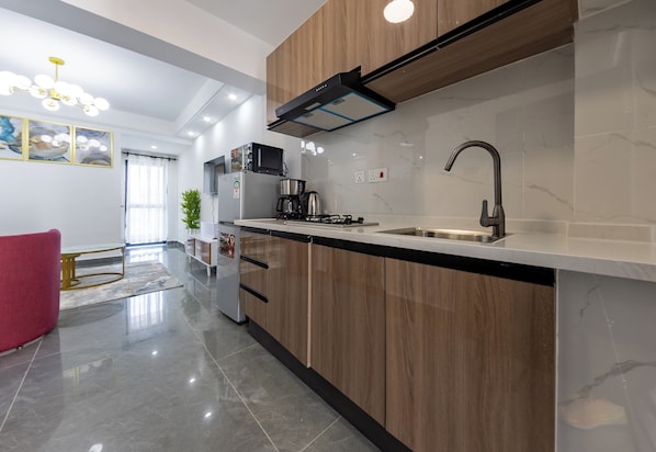 Deluxe Apartment, River View | Private kitchen - Erica Suites - Riverside 1BR Apartments (Nairobi)