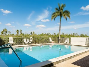 A heated pool - Admirals Bay 152 | Canal Front Condo, Balcony + Community Pool (Fort Myers Beach)