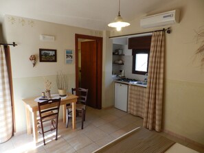 Dining - MACCHIA SALENTINA double studio apartment in residence with swimming pool 2 km from the sea (Marina di Mancaversa Taviano)