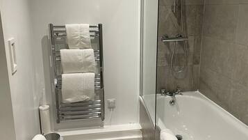 Hair dryer, towels, soap, shampoo