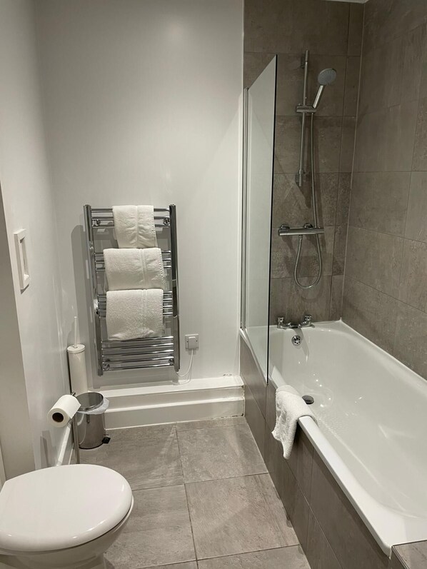 Hair dryer, towels, soap, shampoo
