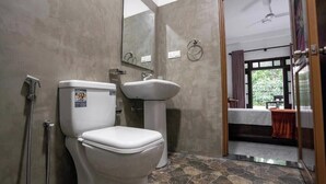 A bathroom with a toilet, sink, and shower. - 10 mins to Surf Point! Newly Renovated Air-Conditioned Balcony Room with WiFi (Matara)