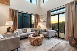 Living area - Location! New Indoor POOL Cabin! Sunset Mnt View! Hot tub, Games, Bunk Room! (Sevierville)