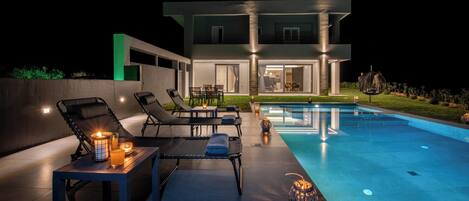 Outdoor pool, pool umbrellas, pool loungers