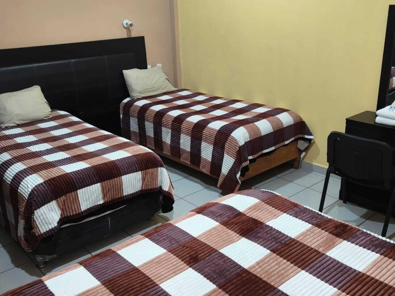 Deluxe Studio Suite, Patio, City View | Desk, laptop workspace, free WiFi, bed sheets