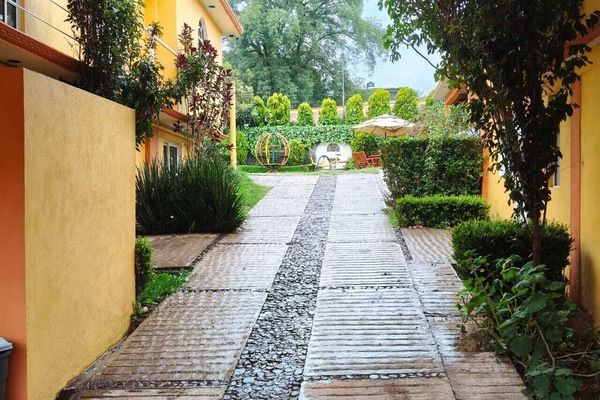 Deluxe Studio Suite, Patio, City View | Property grounds