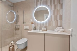 Hair dryer, towels, soap, toilet paper