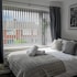 Stylish 4 Bed Apartment- Private Garden & Sleeps 8