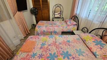 1 bedroom, desk, iron/ironing board, travel crib