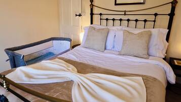 1 bedroom, desk, iron/ironing board, travel crib