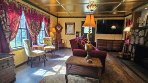 Smart TV, fireplace, books