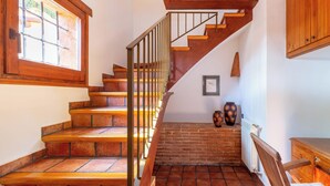 A staircase with wooden steps and metal railings, leading to a lower level. - Bel House fantastic property located in the exclusive urbanization Res.Begur (CT)